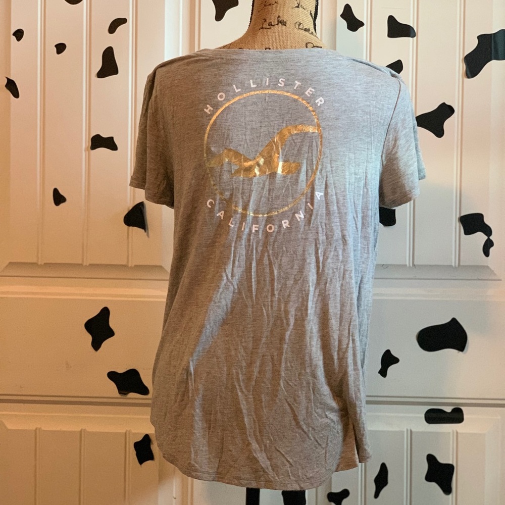 grey t-shirt w gold logo